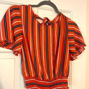 Coral, navy and white striped blouse